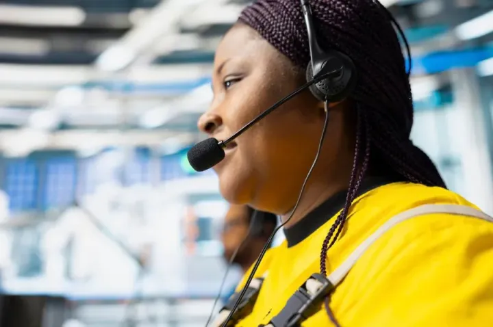 A support agent on a headset