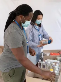 Aid workers packing relief supplies